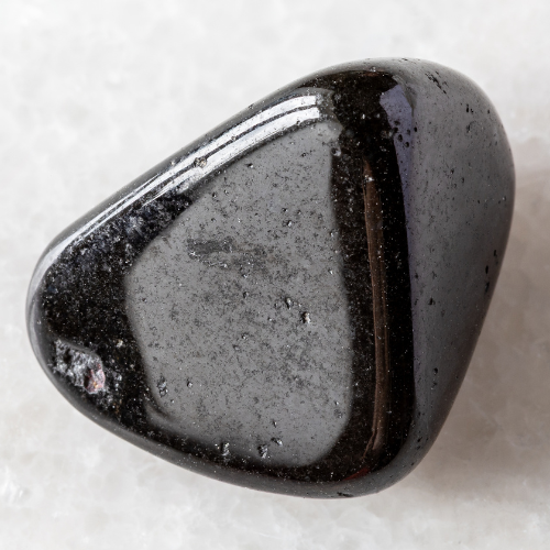 Black Tourmaline: Meaning, Root Chakra Connection, Benefits & How to Use It