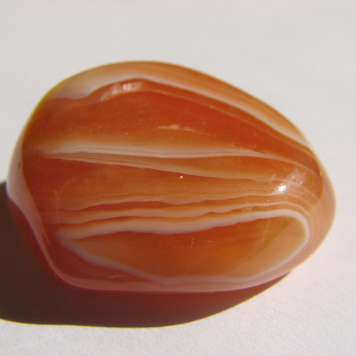 Carnelian: Meaning, Root Chakra Connection, Benefits & How to Use It